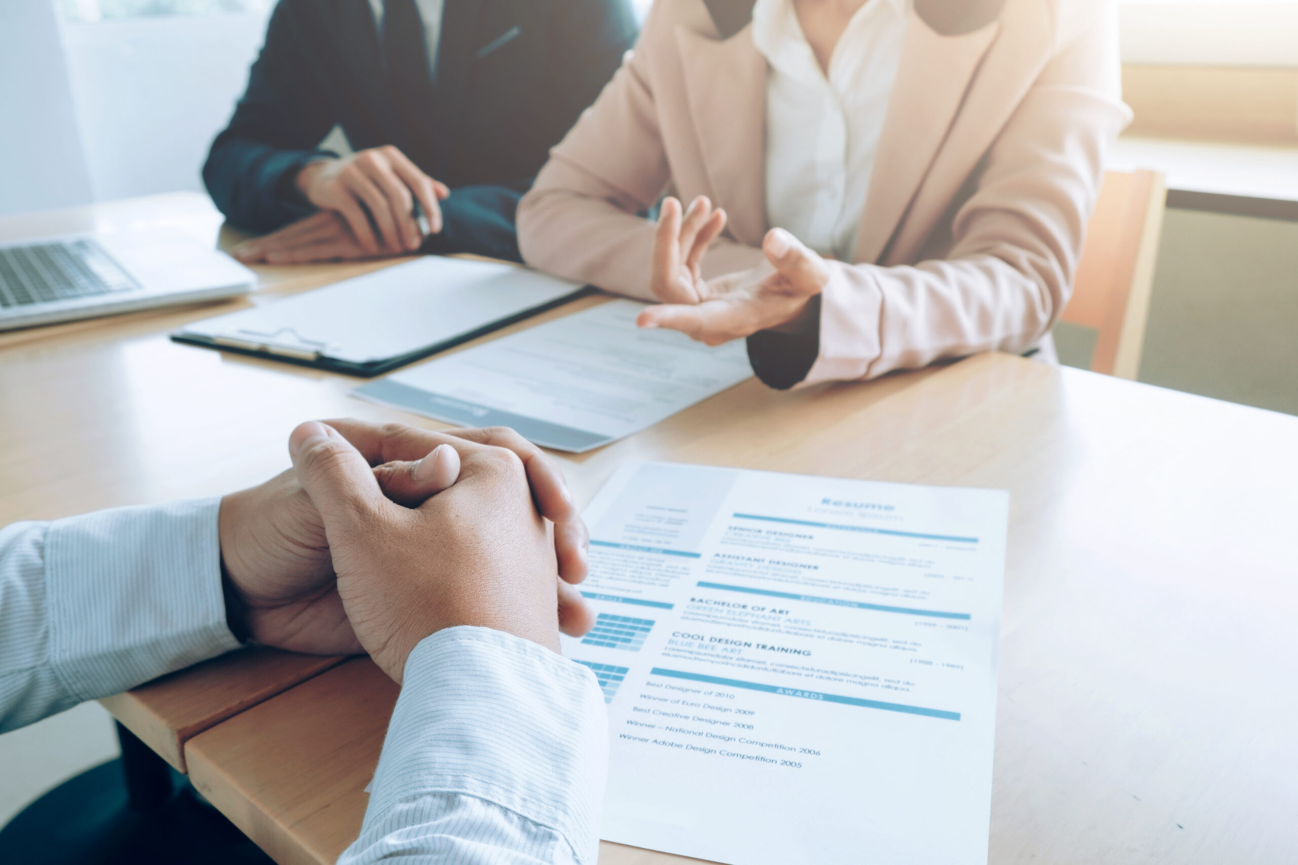 Interviewer and candidate sat at table