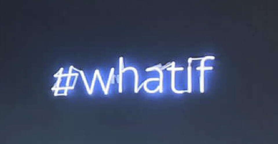 A neon sign in the Talent Works office that says 